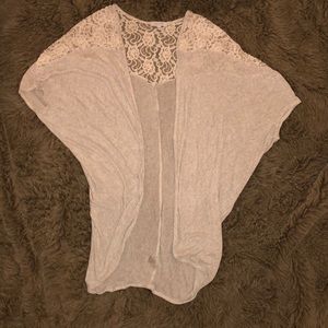 Delia’s lightweight shrug.